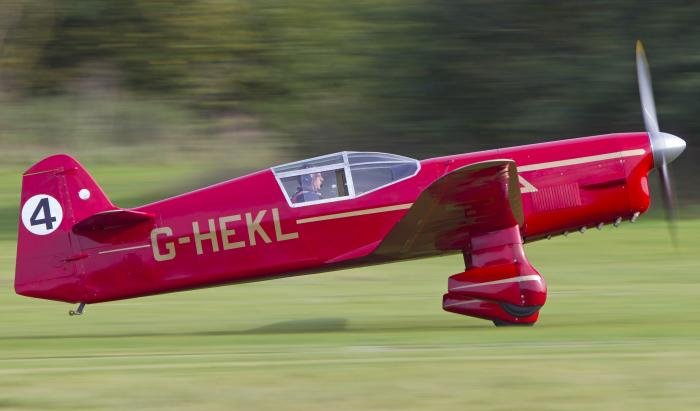 Charlie Huke powers G-HEKL into the air during a display appearance at Old Warden.