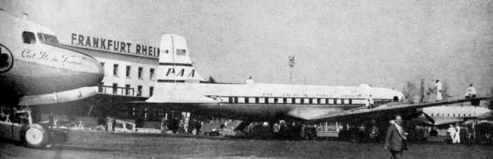 TOURIST TERMINAL – Pan American's tourist class DC-6B "Liberty Bell" at Frankfurt Airport. “Aeroplane” photograph