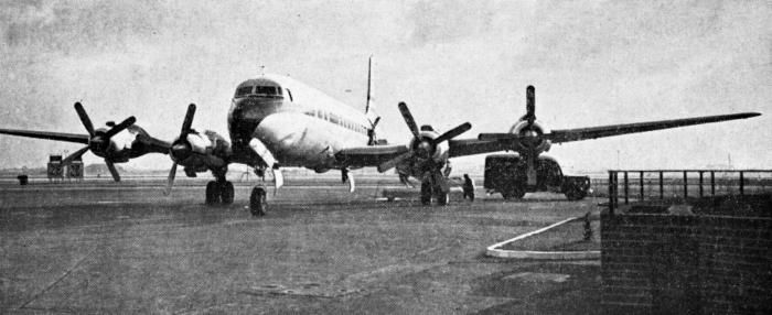 B.O.A.C.'s first DC-7C, taken at London Airport immediately after its arrival on October 31, the additional centre-section span can clearly be seen in this frontal view. Photographs copyright “The Aeroplane”