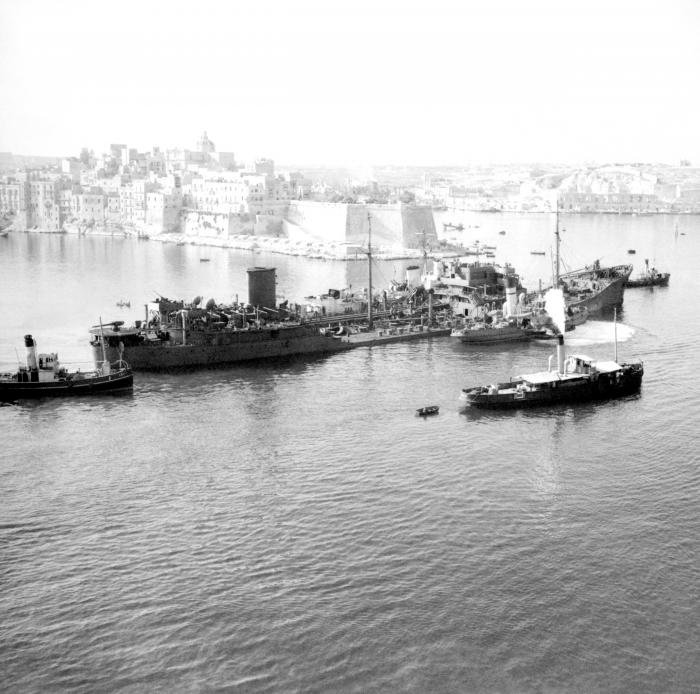 The damaged tanker Ohio, supported by Royal Navy destroyers, finally reaches Malta. The vital importance of Ohio’s cargo meant she could not be abandoned and made it the main target for the Luftwaffe and Italian attacks. Its Captain, Dudley William Mason was subsequently awarded the George Cross