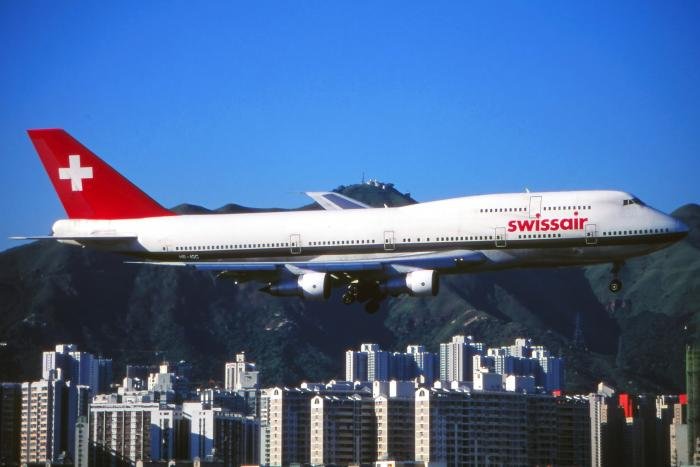 Swissair Boeing 747-300, HB-IGC (c/n 22704), negotiates the approach to Hong Kong's since-closed Kai Tak Airport