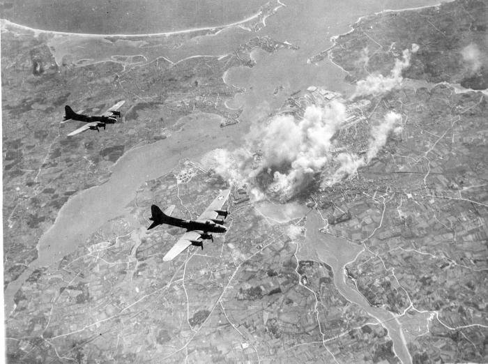 B-17s in flight over the target area. Each aircraft carried a 4,000lb bomb load, a crew of nine or ten and formidable armament