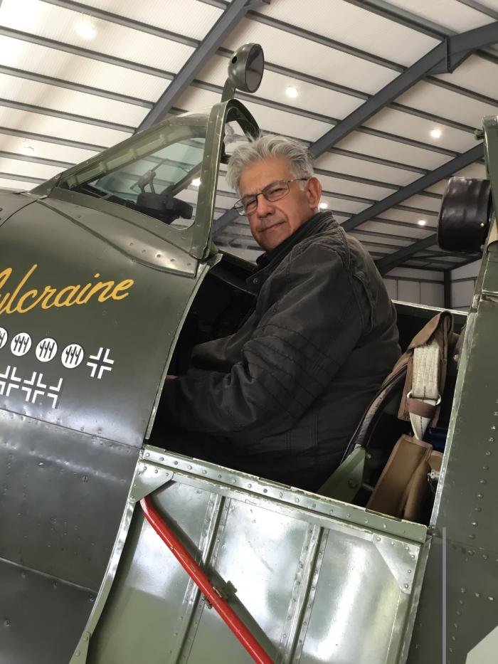 Author Dilip Sarkar MBE in the cockpit of Old Flying Machine Company's Spitfire Mk.IX MH434.