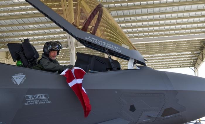 Flying the flag. RDAF test pilot ‘MON’ shows the Danish national flag ‘Dannebrog’, which flew with him on his first flight in an RDAF F-35.