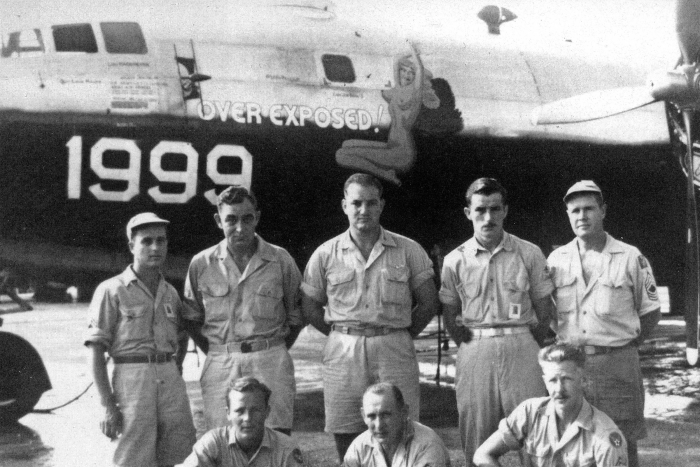 Enlisted personnel assigned to Task Unit 1.5.2 pose with ‘Over Exposed’ between sorties at Kwajalein during Operation Crossroads – the United States’ atomic bomb tests at Bikini Atoll in 1946. The names of the men remain unknown to this day