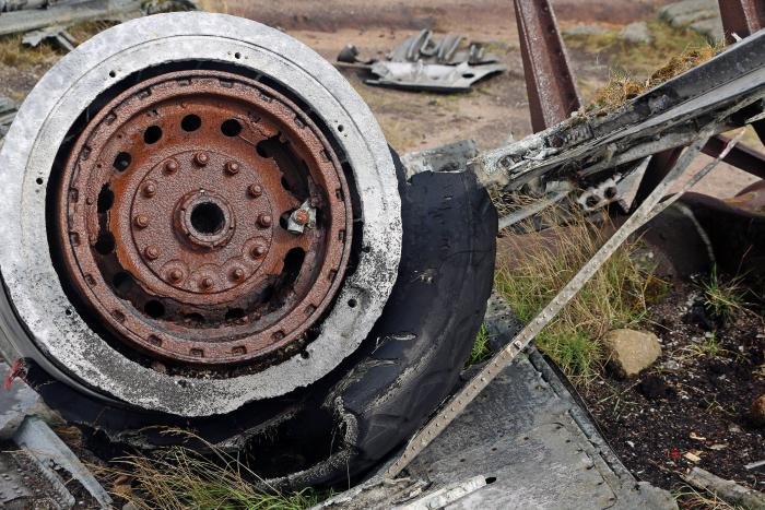 Despite the ferocity of the post-crash fire and more than seven decades of harsh winters, 44-61999’s port main undercarriage still retains most of its tyre