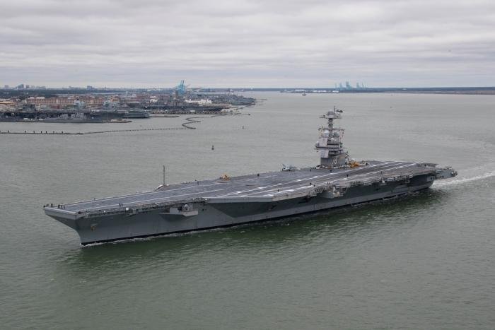 USS Gerald R Ford (CVN 78) departs Naval Station Norfolk on its first deployment, October 4 2022. The Gerald R. Ford Carrier Strike Group (GRFCSG) is deployed in the Atlantic Ocean,