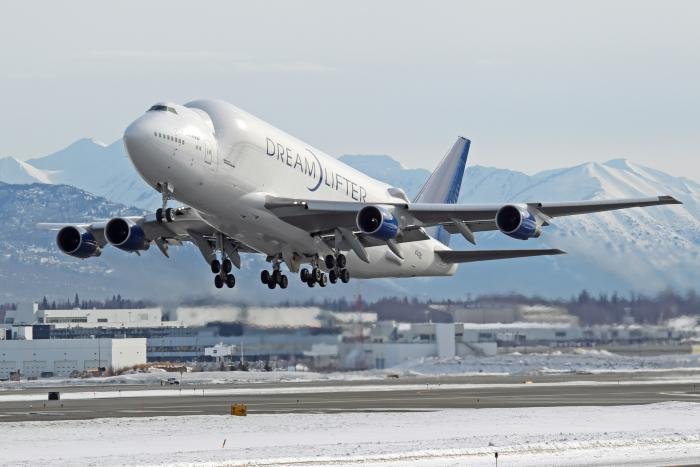 Boeing holds a fleet of four Dreamlifters. Seen here in 2013, N747BC (c/n 21048), departs Anchorage in the US.
