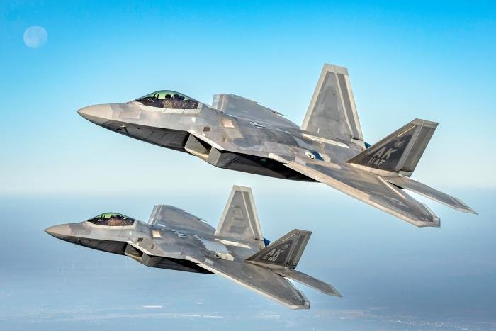 Two USAF F-22 Raptors assigned to the 90th Expeditionary Fighter Squadron conduct a two-ship formation during the NATO Air Shielding. The Raptors are flying out of Lask Air Base for Air Shielding mission alongside Polish F-16s and Italian Eurofighter Typhoons. The U.S. remains dedicated to security commitments with NATO Alliance and postured to defend NATO territory. All images Giovanni Colla