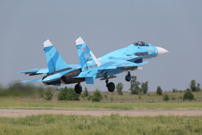 This is a Su-27SM fighter of the original upgrade standard, introduced in the 2000s, featuring increased air-to-air capability in addition to the newly-added arsenal of guided air-to-surface munitions