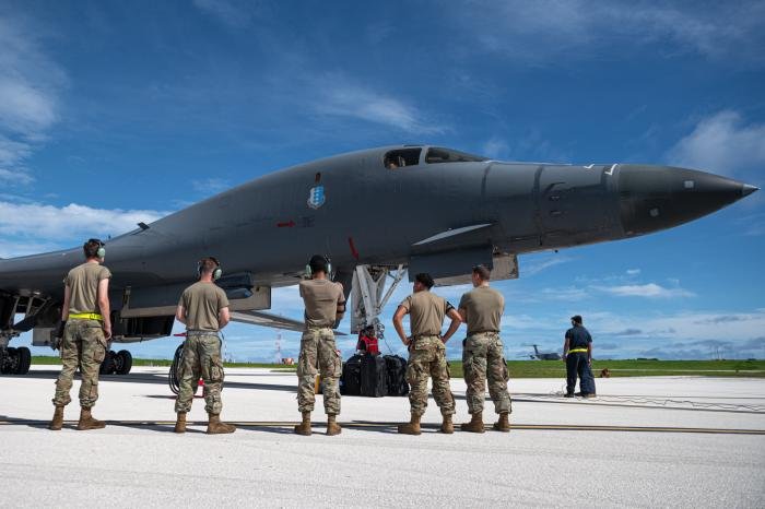 Airmen assigned to the 28th BW receive a USAF B-1B from the 37th BS 'Tigers' after the supersonic-capable, variable-sweep wing strategic bomber arrived at Andersen AFB for a BTF deployment on October 18, 2022.