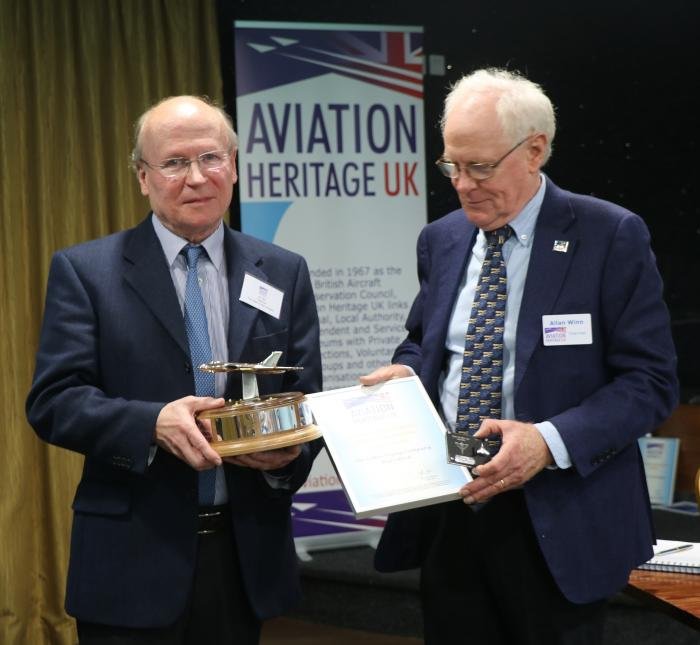 Ian Gee, left, chairman of The Lakes Flying Company, accepts the Robert Pleming Memorial Award for the Waterbird project from AHUK chairman Allan Winn.