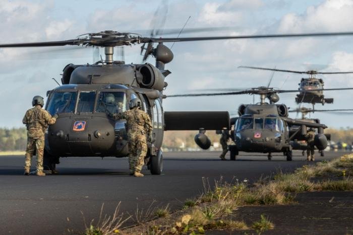 Arrival of U.S. Army Europe 12th Combat Aviation Brigade UH-60 Black Hawk helicopters at Vredepeel, the Netherlands, for multinational helicopter exercise Falcon Autumn.