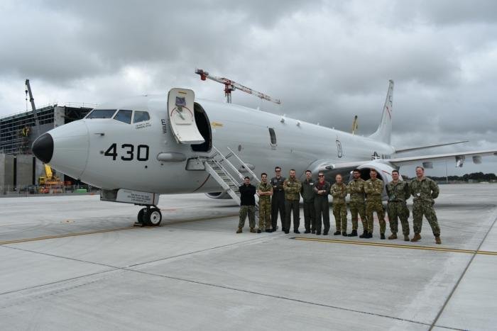 Members of Patrol Squadron (VP) 10 and the Royal New Zealand Air Force pose in front of a US Navy P-8A Poseidon during Operation Kuru Kuru. The VP-10 “Red Lancers” are currently operating from Kadena Air Base in Okinawa, Japan, conducting maritime patrol and reconnaissance, as well as theater outreach operations, as part of a rotational deployment to the U.S. 7th Fleet area of operations.