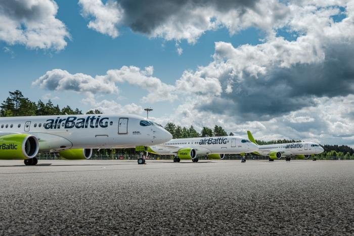 Currently, airBaltic has 36 Airbus A220-300s, including this 2017-built example, YL-CSG (c/n 55009), in the foreground, which is joined by a pair of its stablemates