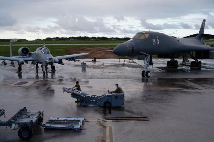 A 74th FS-operated A-10C parked next to a B-1B Lancer (assigned to the USAF's 28th Bomb Wing) at Andersen AFB on November 4, 2022. Note that the A-10C is being loaded with Miniature Air-Launched Decoy (MALD) craft by personnel from the 74th Fighter Generation Squadron.