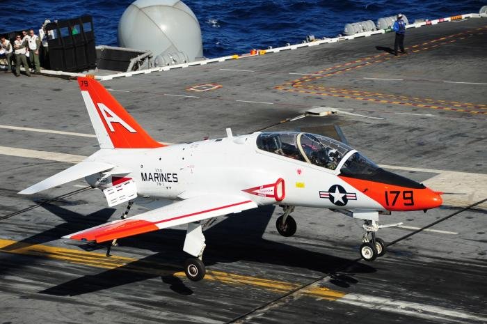 A USMC-operated McDonnell Douglas T-45C Goshawk assigned to Training Air Wing 1 (TAW-1) comes in to land on the flight deck of the aircraft carrier, USS Theodore Roosevelt (CVN-71), after completing a local training sortie on September 12, 2013.