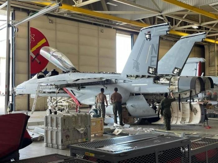 Boeing EA-18G Growler (BuNo 157015 'NE-515') undergoes refurbishment at NAS Whidbey Island in Washington. This aircraft was involved in a mid-air collision in 2017 and will soon be returned to a forward-deployable squadron after it successfully completed its functional check flight on October 17, 2022.