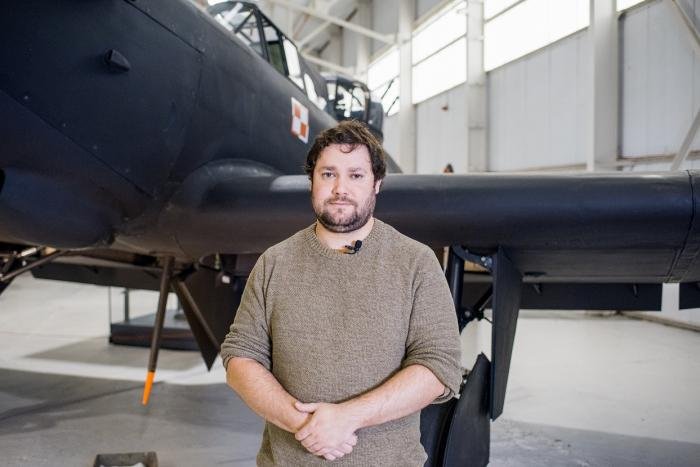 Curator Tom Hopkins with the Defiant