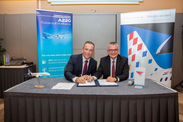 Ville Arhippainen Airbus VP sales for western and southern Europe (left), and Croatia Airlines CEO and president of the management board, Jasmin Bajić sign the paperwork for the A220 order