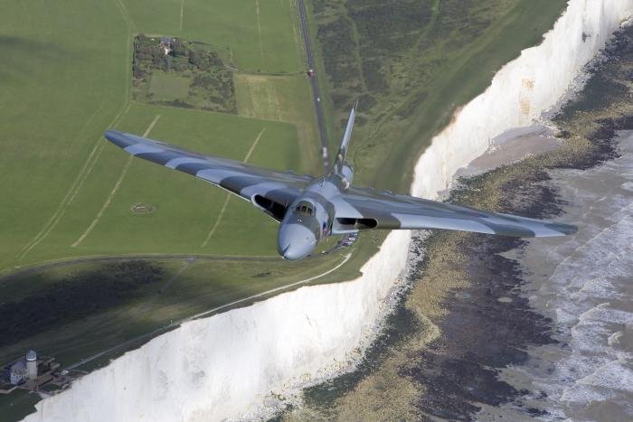An iconic sight, never to be seen again. XH558 powering over the white cliffs