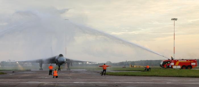 Receiving the customary final salute from the Airport Fire Service at Robin Hood Airport