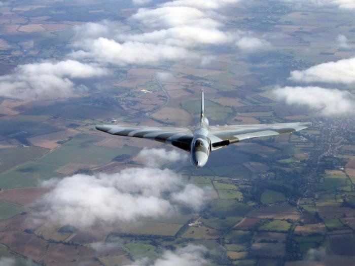 Coming up fast behind the open ramp of a Hercules in the first of two air-to-air sorties Richard Clarke experienced with the Vulcan