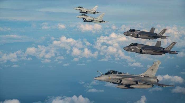 A French Rafale is joined by four RAF fighters - comprising two F-35Bs and a pair of Typhoon FGR4s - during a sortie over the North Sea as part of Exercise Griffin Dawn on December 6, 2022.