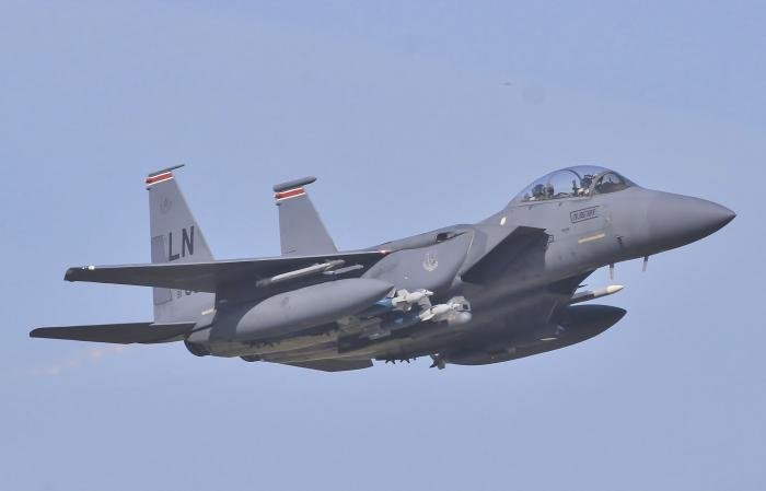 F-15E 91-0603 with a mixed training munitions load including GBU-16 and 1,000lb dumb bombs when performing a sortie on April 21.