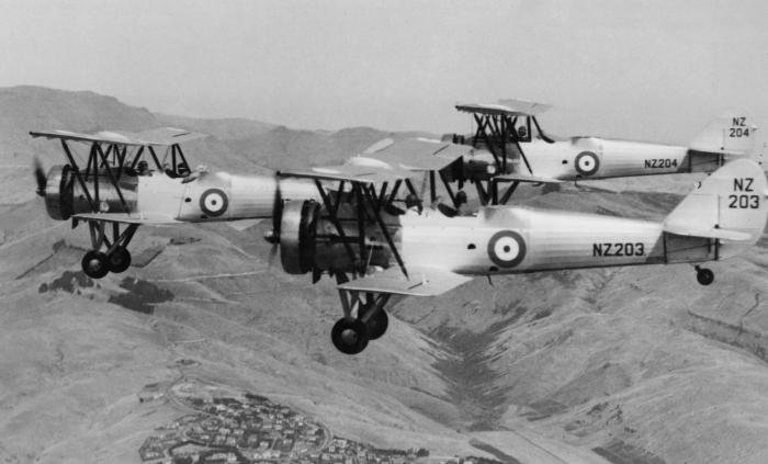 Three of the RNZAF’s four Avro 626s in formation over the Port Hills, near Christchurch, with NZ203 in the foreground.