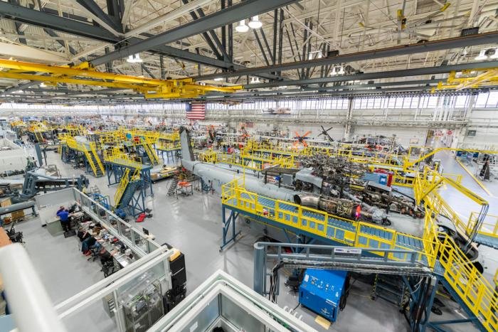 Sikorsky employees building CH-53K® aircraft utilizing 3-D work instructions, new titanium machining centers with multi-floor ergonomic platforms.
