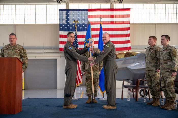 USAF Lt Col Andrew 'Lite' Gray (right), director of operations with the 94th FS 'Hat in the Ring' - a frontline fighter unit equipped with the F-22A Raptor - assumes command of the 71st FS 'Ironmen' from Col Brandon Tellez (left), commander of the 1st OG, at Joint Base Langley-Eustis, Virginia, on January 6, 2023.