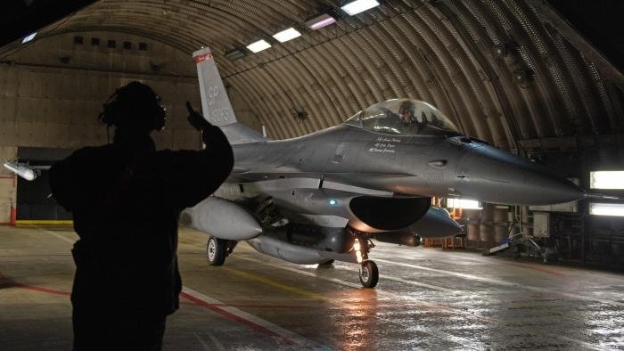 52nd Aircraft Maintenance Squadron crew chief, signals thumbs up while launching an F-16CM Fighting Falcon aircraft assigned to the 480th Fighter Squadron at Spangdahlem Air Base, Germanya as the unit  deployes to Kadena Air Base, Japan, to enhance the US posture in the region and to build on the strong alliance with Japan.