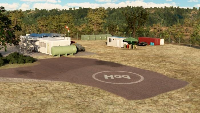 The site features various objects, such as off-road vehicles, fuel a tank and a helo depot with solar panels.