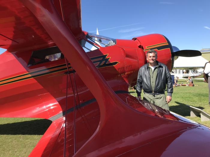 Rob Wildeboer pictured with Beech D-17S Staggerwing ‘The Red Rockette’ in 2019