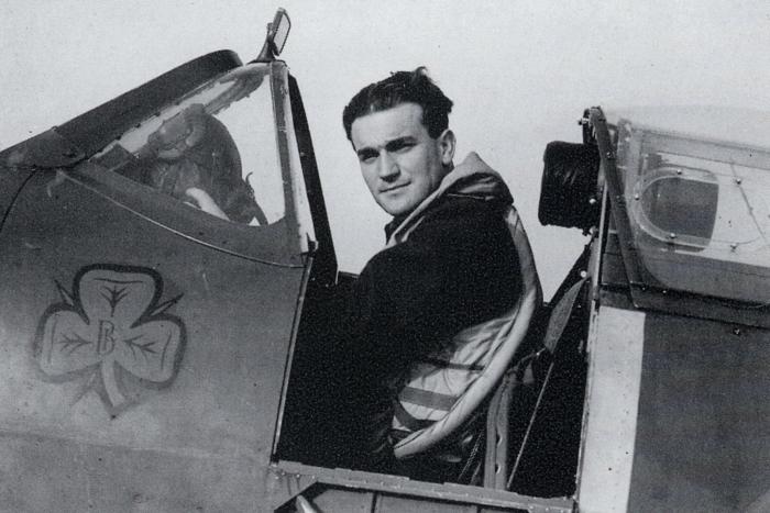 A now iconic image of Finucane seated in the cockpit of his Shamrock-marked  Spitfire Mk.Vb