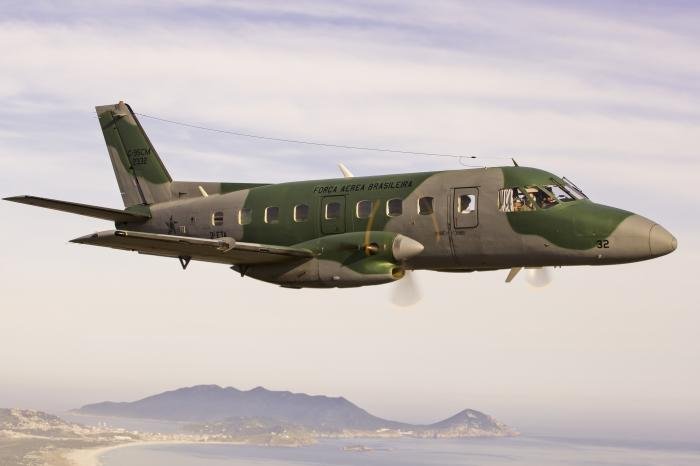 A modernised Embraer C-95CM Bandeirante light transport in flight over the Brazilian state of Rio de Janeiro on February 8, 2012. The FAB received its first C-95A on February 9, 1973.