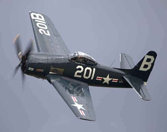 That stalwart of The Fighter Collection's fleet, the F8F-2P Bearcat, always thrills at Flying Legends.