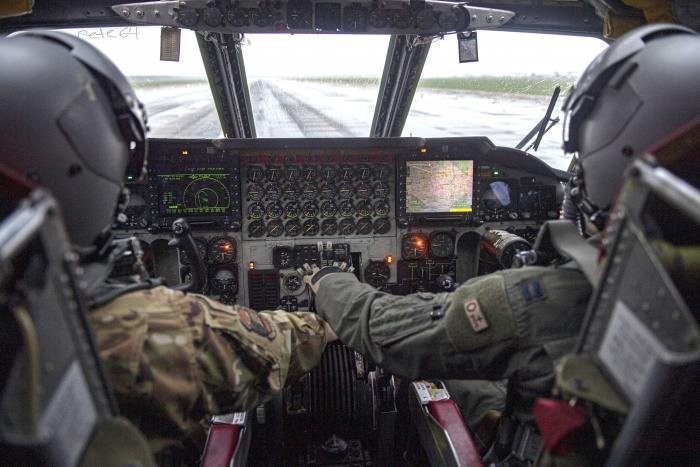 U.S. Air Force pilots assigned to the 20th Bomb Squadron pull the throttle back during take off in a rainstorm on a B-52 Stratofortress from Barksdale Air Force Base, La. on August 23, 2022. The B-52 is a long-range, heavy bomber that can perform a variety of missions and has been the backbone of U.S. strategic bomber forces for more than 60 years.