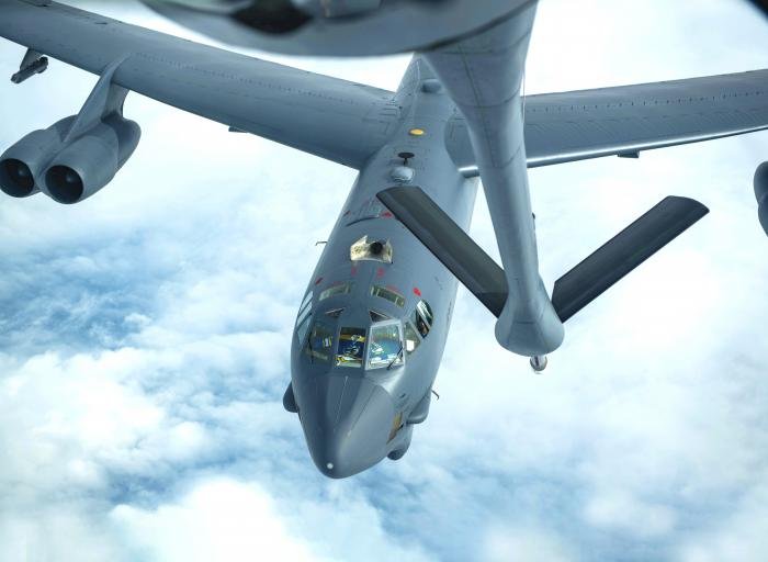 USAF 5th Bomb Wing B-52 Stratofortress approaches a USAF KC-135 Stratotanker, assigned to the 909th Air Refueling Squadron, to perform aerial refueling over the Pacific Ocean
