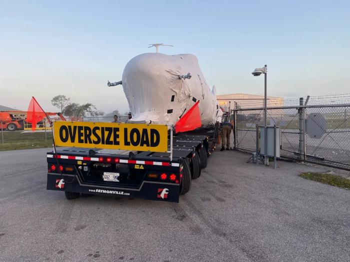 The Flying Fortress is transported home by road