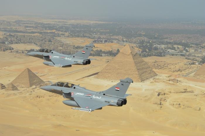 A pair of Egyptian Air Force Dassault Rafale DMs overfly the Great Pyramids of Giza
