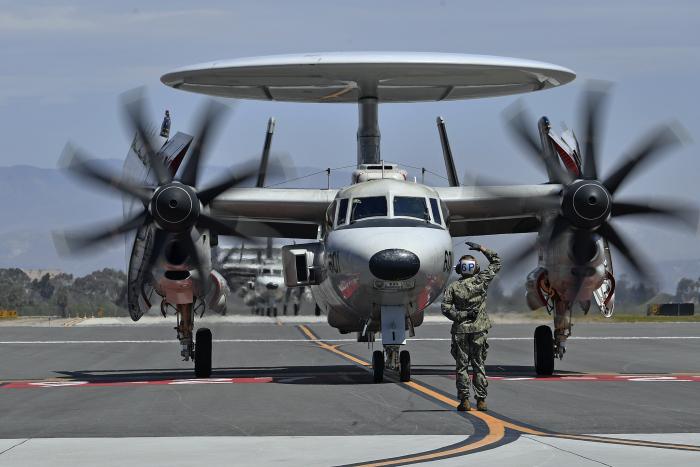 An E-2D Advanced Hawkeye assigned to the US Navy's Airborne Command and Control Squadron 117 (VAW-117) 'Wallbangers' arrives at Naval Base Ventura County, California, after completing a seven-month deployment with Carrier Air Wing 9 (CVW-9) aboard USS Abraham Lincoln (CVN-72) on August 9, 2022.