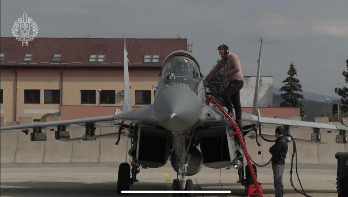 Ukrainian pilot and ground crew