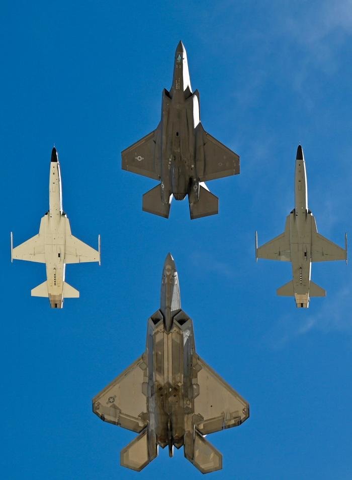 Legacy: USAF F-35 Lightning II Deomnstartion Team pilot Maj Kristin ‘Beo’ Wolfe leads Tommy Williams and Dan Friedkin in the F-5s, with Capt Samuel ‘RaZZ’ Larson of the F-22A Raptor Demonstration Team tucked in behind over Davis-Monthan Air Force Base on March 5, 2023