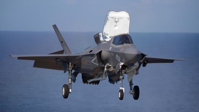 An F-35B Lightning II assigned to the USMC's Marine Fighter Attack Squadron 242 (VMFA-242) 'Bats' conducts a vertical landing aboard the JMSDF-operated helicopter carried, JS Izumo (DDH-183), off the coast of Japan on October 3, 2021.