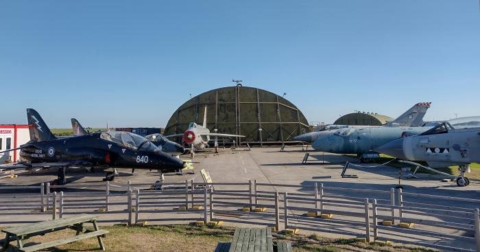 The main building at the Cornwall Aviation Heritage Centre was one of the RAF St Mawgan hardened aircraft shelters from the early 1980s. A broad line-up of UK military Cold War jets was exhibited outside, maintained by a force of 60 retired volunteers.