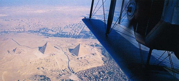 The Giza Plateau, with Sphinx visible near the bottom of the picture just to the left of the black road, and Cairo's outskirts lapping at its feet.