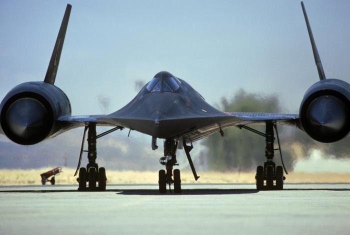A front view of an SR-71A aircraft on the flight line.