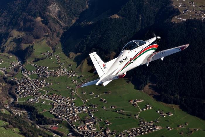 A Royal Jordanian Air Force Pilatus PC-21 is framed against the Swiss scenery on a pre-delivery flight. Thus far, the turboprop-powered type has amassed more than 235 orders